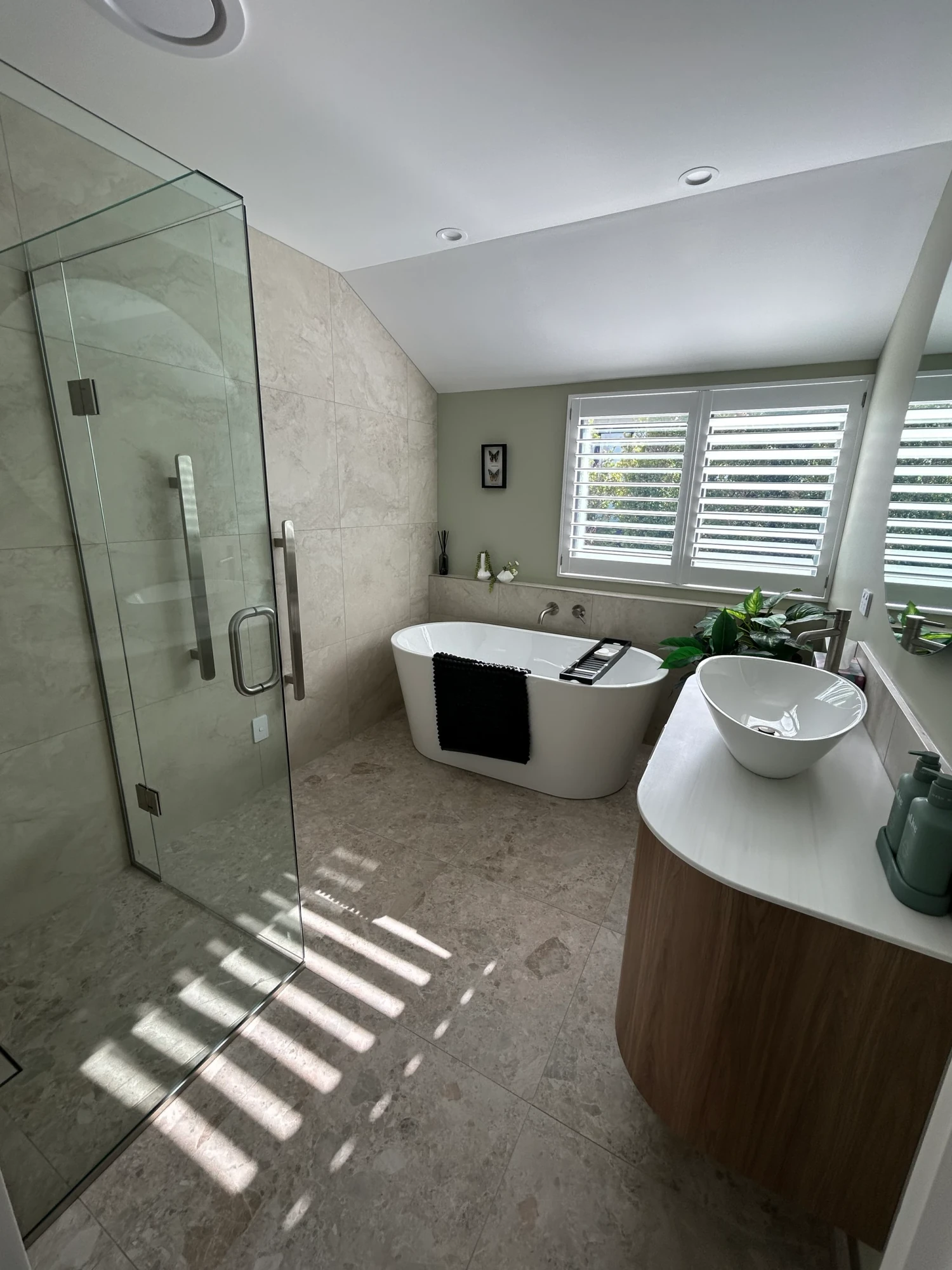 Full bathroom renovation with freestanding bath