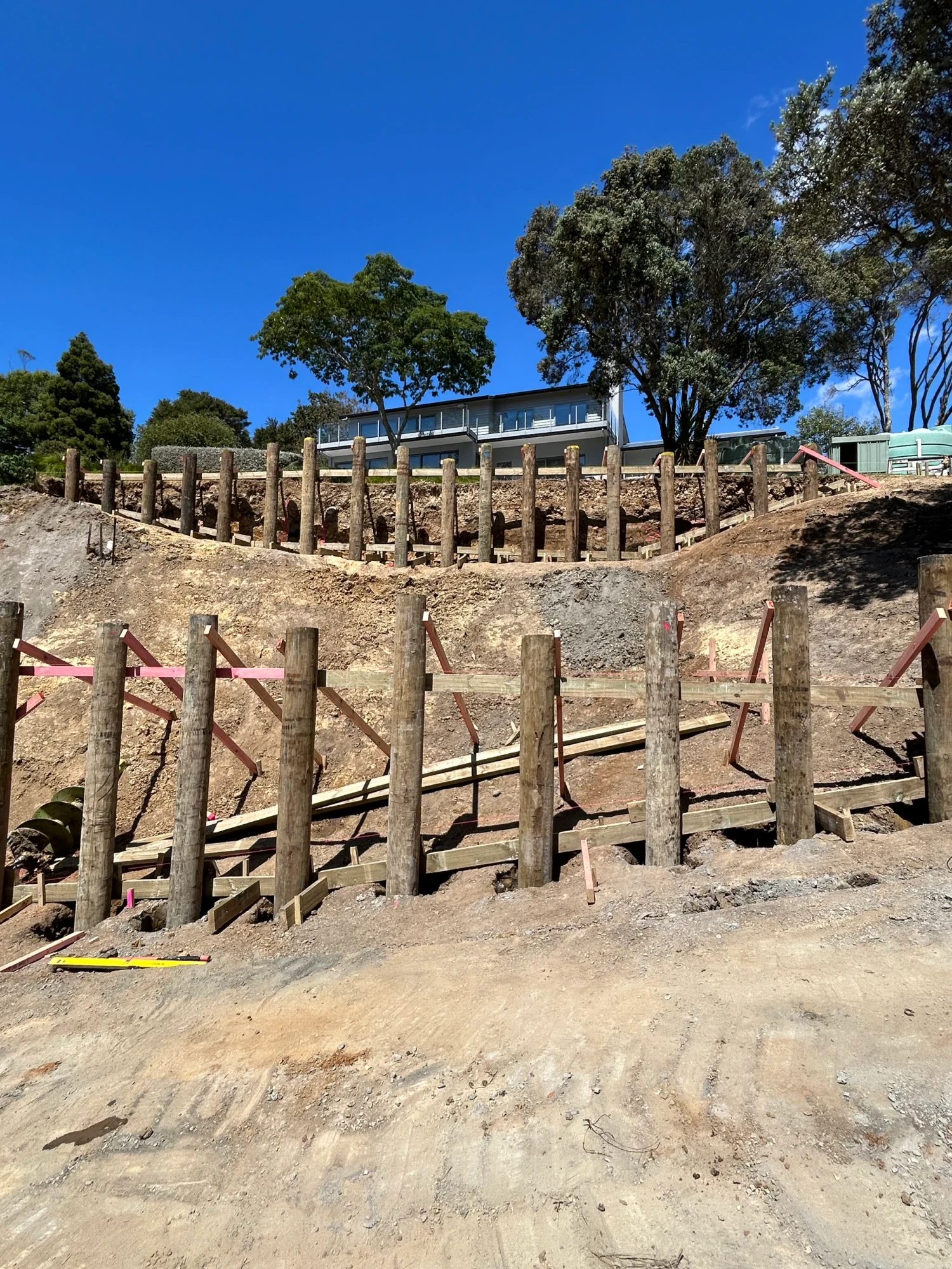 Engineered retaining wall detail with drainage by LSM Construction